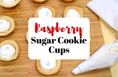 These raspberry sugar cookie cups are as delicious as they are adorable! Filled with cream and topped with a berry, they're simple as can be!