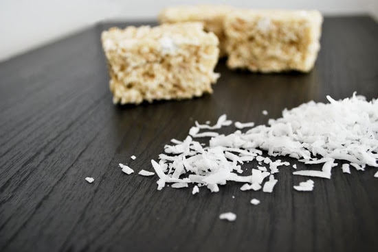 these coconut rice krispy treats are winners. The toasted coconut adds that awesome nutty flavor as well as pumps up the soft chewiness of these treats. Get the recipe on www.orsoshesays.com #recipe #dessert #treats #coconut #ricekrsipytreats #coconutricekrispytreats