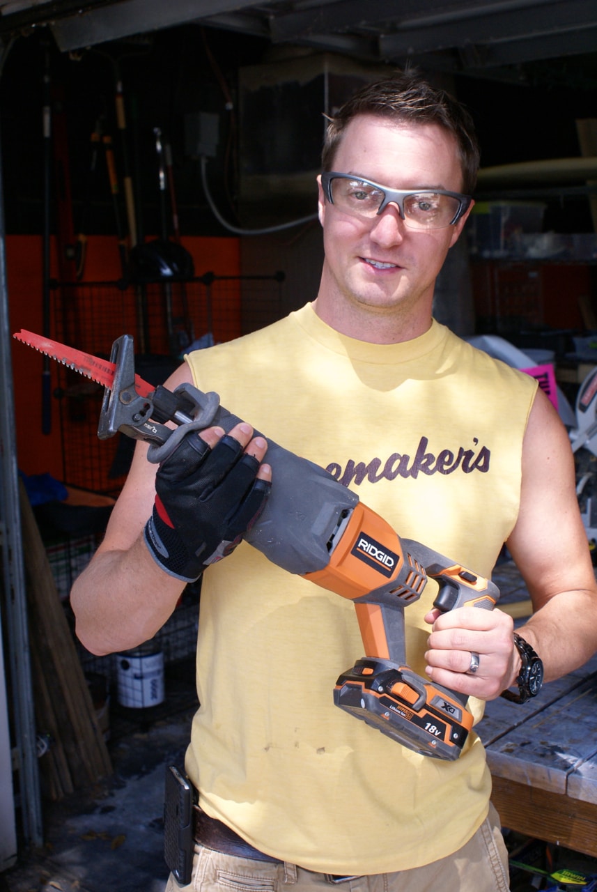 A happy camper with his RIGID reciprocating saw.