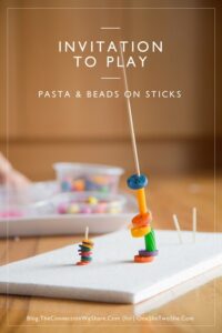 Set up an  invitation to play using pasta an beads on sticks.