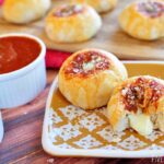 Mozzarella Bubble Biscuits ~ stuffed with gooey melted cheese, these make a perfect appetizer, snack, or accompaniment to Italian fare | FiveHeartHome.com for OneSheTwoShe.com