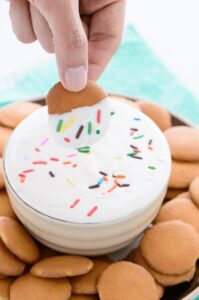 Funfetti Cheesecake Dip - Sweet cheesecake dip with funfetti sprinkles. So easy and perfect with graham crackers, vanilla cookies, or your favorite fruit.