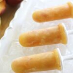 Fresh peaches and pineapple make these tropical peach popsicles sweet, delicious and perfect for those hot summer days.