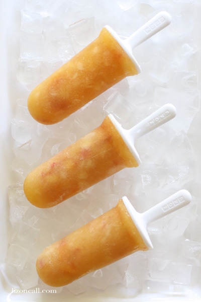 Fresh peaches and pineapple make these tropical peach popsicles sweet, delicious and perfect for those hot summer days.