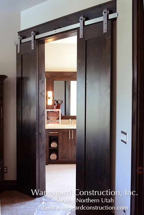I love the sliding door! Lots and lots of finish carpentry ideas from Mariel's husband!