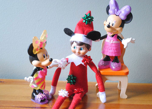 Adelle has put a spin on a popular Christmas tradition and is sharing Elf on the Shelf Disney Style today! Get all her ideas on www.orsoshesays.com. #elfontheshelf #disney #disneyelfontheshelf #elfontheshelfideas #elf #christmas #familytraditions