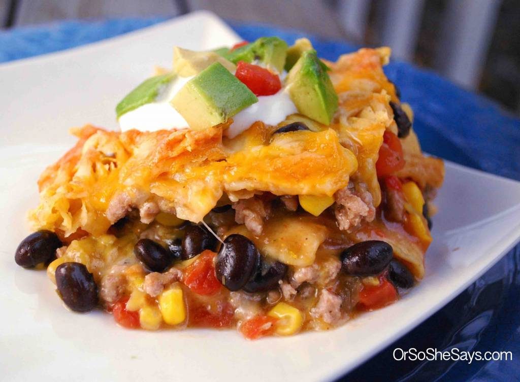 Green Chili Nacho Casserole - a simple weeknight dinner recipe loaded with ground beef, black beans, corn, cheese and tortilla chips