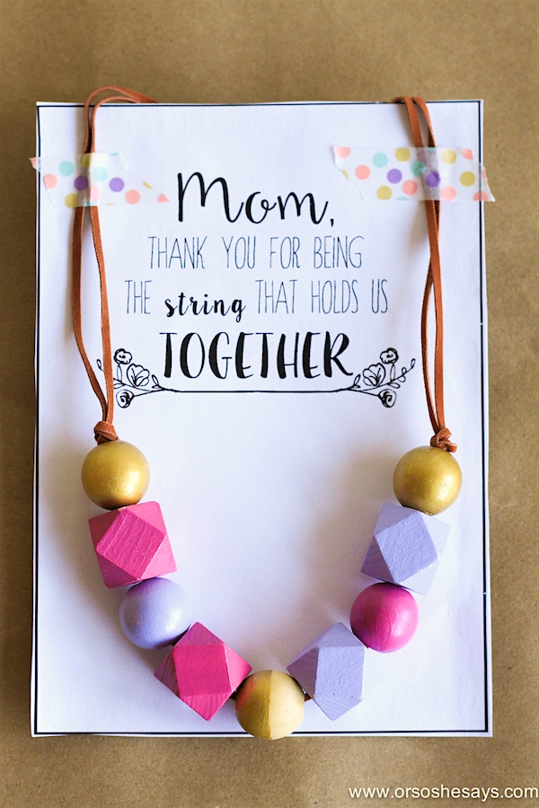 Or So She Says- This Mother's Day Necklace idea is the perfect gift for any woman in your life! Make one with the kids today! Plus it comes with a free printable card to finish it off.