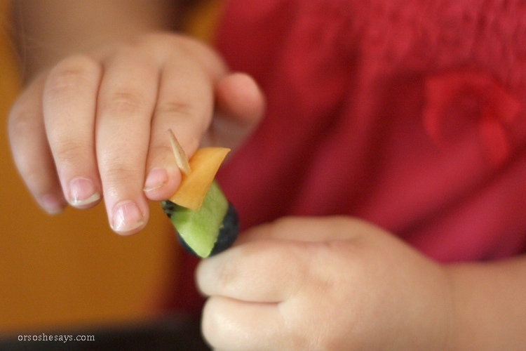 Summer fruit is in season and it is the perfect snack for kids. Get them excited about eating healthy and make some mini fruit kabobs together. www.orsoshesays.com #recipes #summer #healthy #fruitkabobs