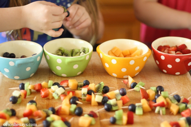 Summer fruit is in season and it is the perfect snack for kids. Get them excited about eating healthy and make some mini fruit kabobs together. www.orsoshesays.com #recipes #summer #healthy #fruitkabobs