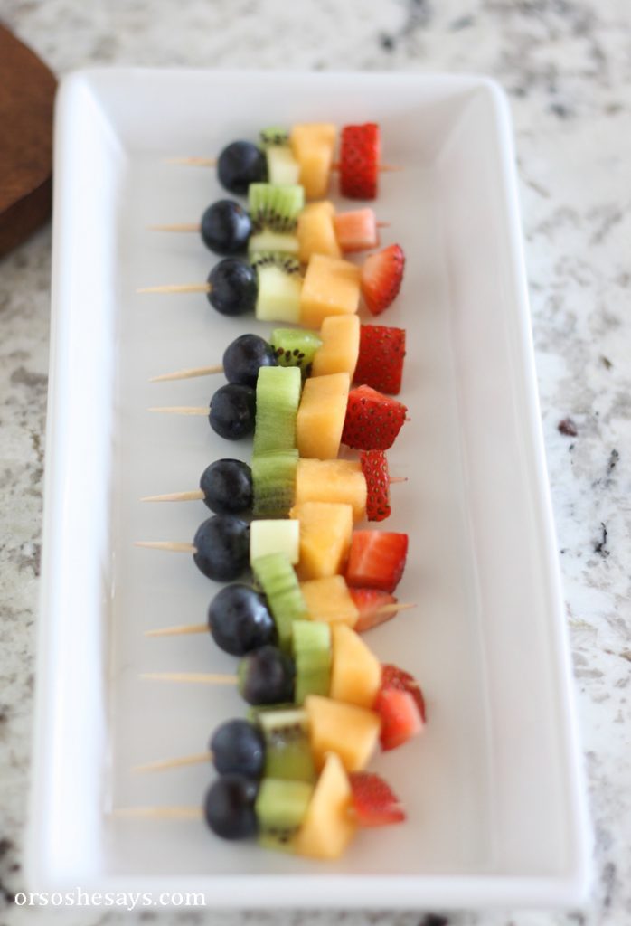 Summer fruit is in season and it is the perfect snack for kids. Get them excited about eating healthy and make some mini fruit kabobs together. www.orsoshesays.com #recipes #summer #healthy #fruitkabobs