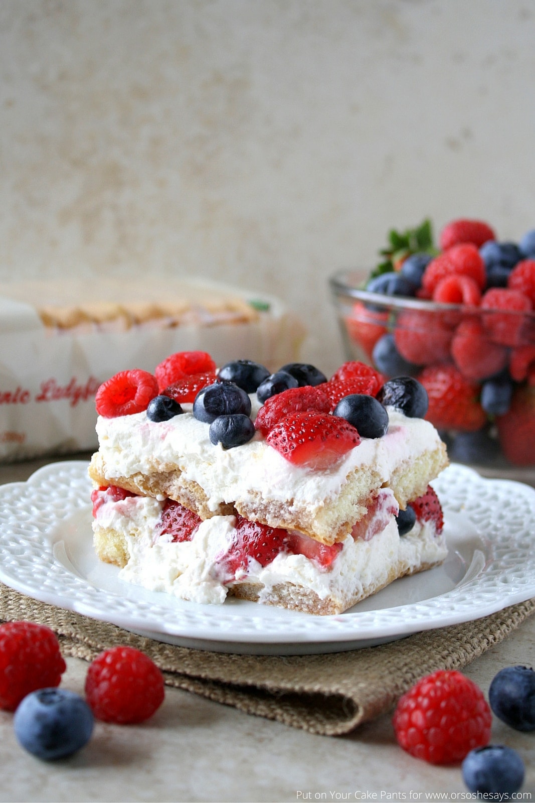 Mixed Berry Tiramisu is a fresh, summery take on a classic. See the recipe at www.orsoshesays.com.