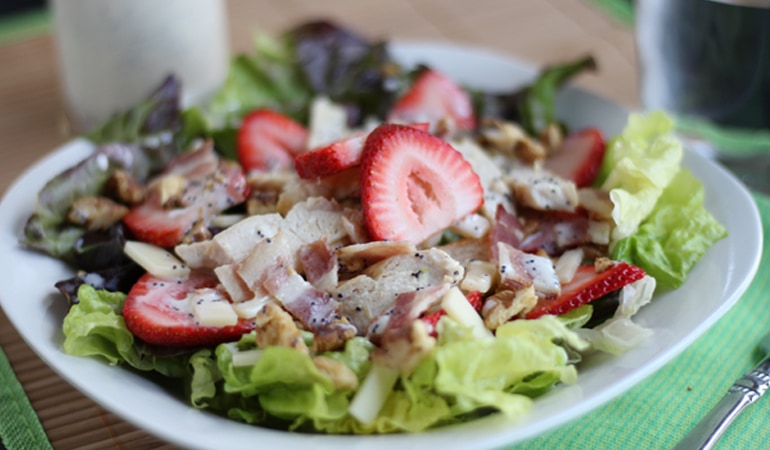 Try this summer strawberry salad paired with grilled chicken, bacon and creamy poppyseed dressing. The kids will LOVE all these elements, even if you have to separate them on the plate! Get the recipe on www.orsoshesays.com.