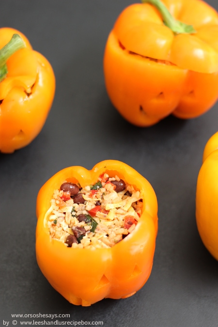 These jack-o'-lantern stuffed peppers are so easy and would make the most fun dinner for Halloween night or a Halloween party! See the how-to on www.orsoshesays.com today.