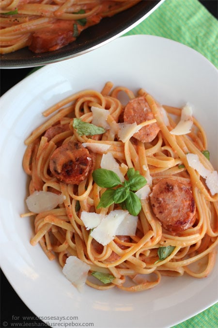 Roasted red pepper and sausage alfredo is a crowd-pleaser! Check out the recipe today on www.orsoshesays.com.
