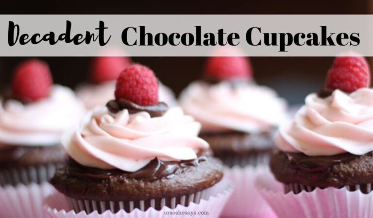 Perfect for Valentine's Day, these decadent chocolate cupcakes are topped with ganache and raspberry buttercream frosting. Get the recipe on the blog today! www.orsoshesays.com