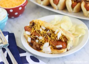 Whether watching the big game at home or at the stadium, these chili dogs would be a great addition to your tailgate spread.