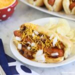 Whether watching the big game at home or at the stadium, these chili dogs would be a great addition to your tailgate spread.