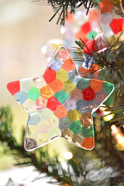 My 4th and 5th grade class made this craft.Tiny Christmas ornaments made  from clear…