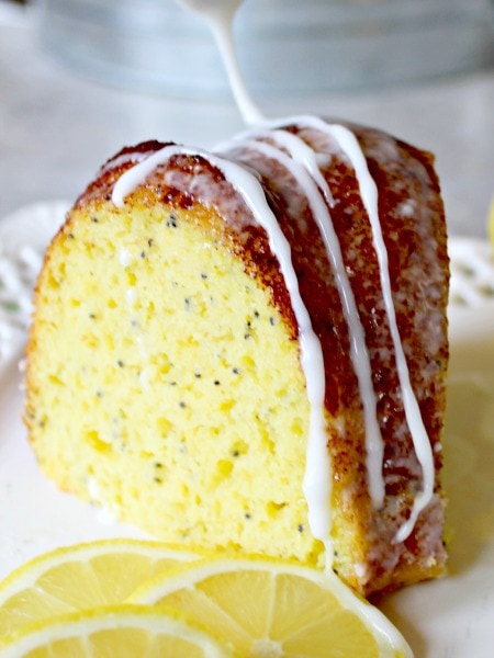  There are different variations to this lemon bundt cake that are super easy to make. Our favorite is the way it is made in the video & in the recipe instructions, with lemon, almond and poppy-seed, but you can experiment if you're not a lemon lover *gasp*! Get all the info on www.orsoshesays.com. #OSSSFeedtheFamily #OSSSDesserts #OSSS #orsoshesays #mormonblogger #mormon #ldsblogger #lds #lemoncake #lemonbundtcake #lemonalmondpoppyseedcake #bundtcake #dessert #lemoncake #poppyseedcake #almondcake