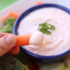 Whether it's on pizza night or you need to bring something for a potluck, a veggie tray with veggie dip is a quick and versatile side dish you can feel good about serving! Get this easy chive and garlic #veggiediprecipe on the blog today! www.orsoshesays.com #healthyrecipes #veggies #dip #veggietray #ldsblogger #family #familyrecipe #apps #appetizers #osssfeedthefamily #snacks