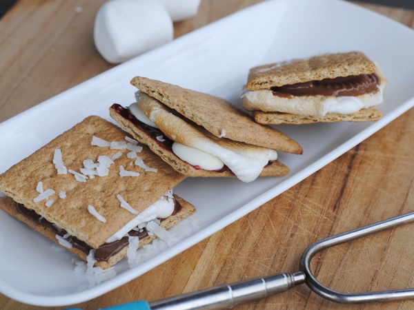 More S'more Recipes to enjoy around the campfire this Summer! #S'more #OSSS #FamilyFun #Campfire #SummerFood www.orsoshesays.com